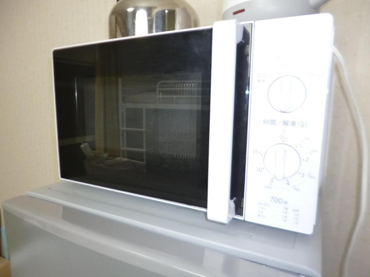 Apartmán ザミッキーカールトン井尻102 Shiobaru Exteriér fotografie